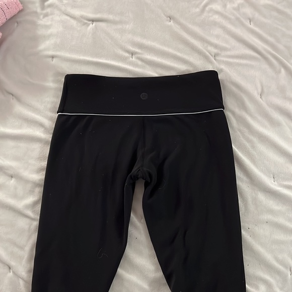 Size 4 Lululemon leggings with white stripe - Picture 3 of 3